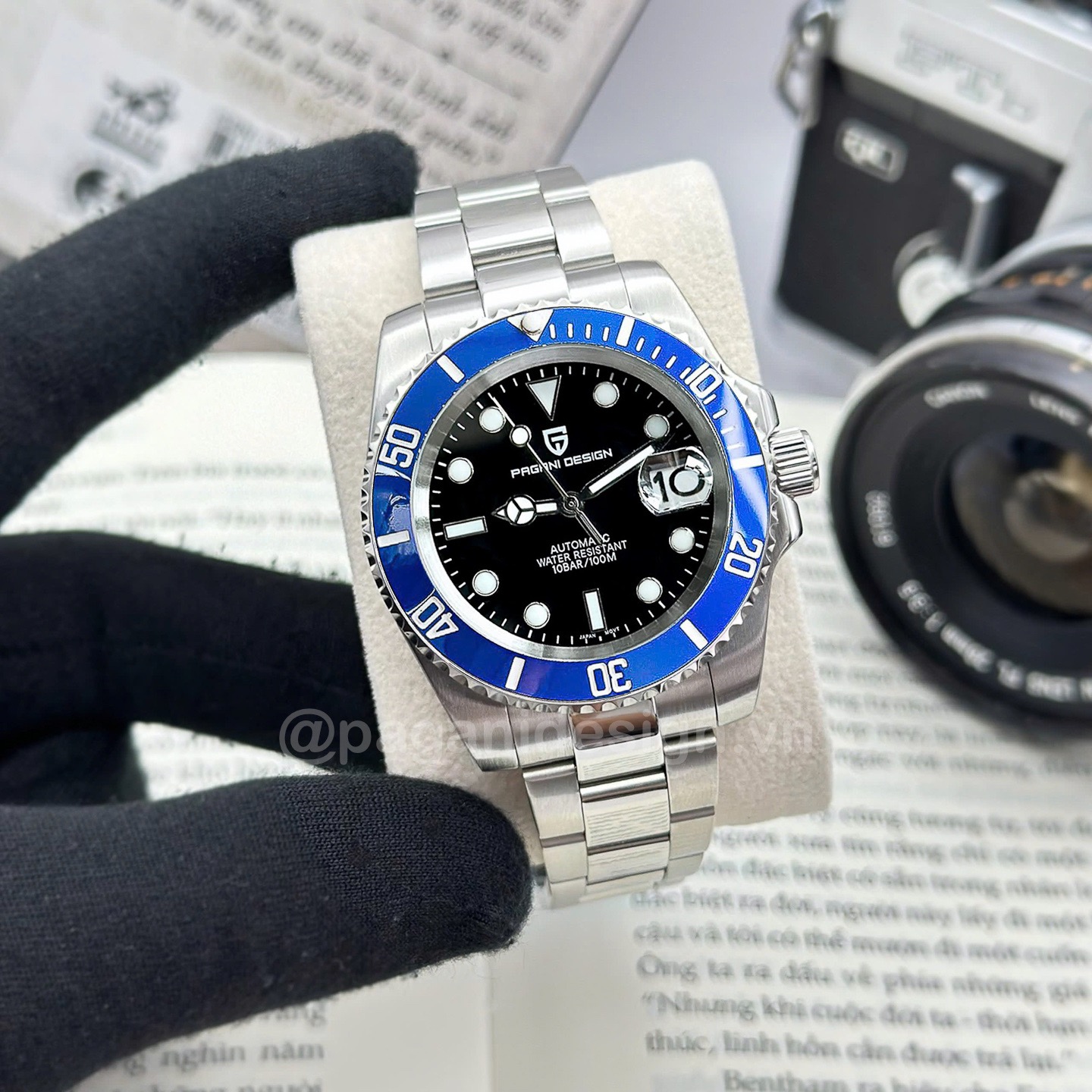 166102